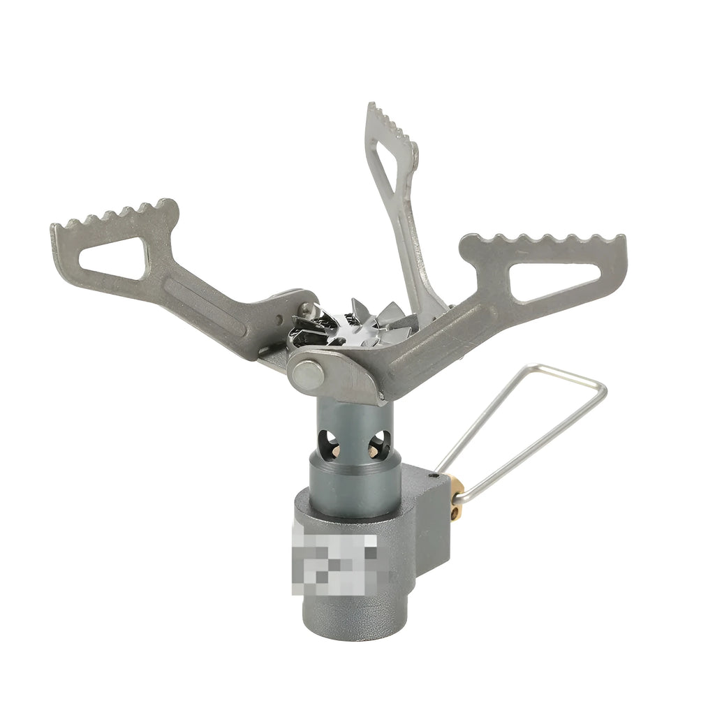 Compact portable propane camping stove with one-piece pressed steel furnace, black finish, and extended legs on a rocky surface.