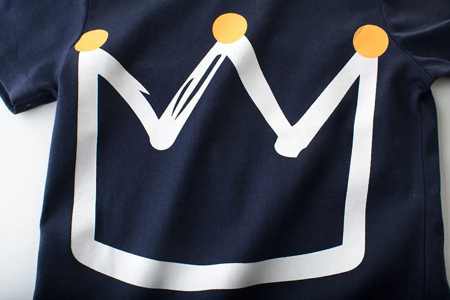Royal blue short sleeve cotton T-shirt for boys on a size chart showing measurements for 90cm to 140cm.