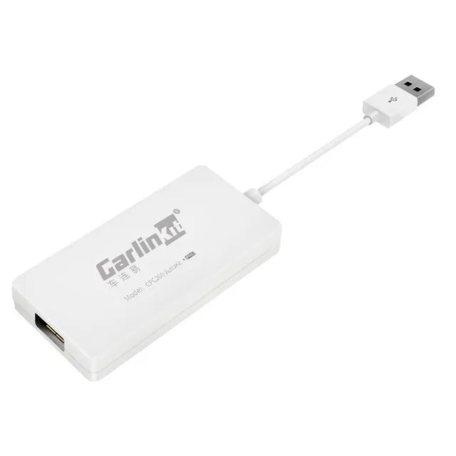 Black Wireless CarPlay USB dongle adapter for connecting iPhone to car navigation screen.