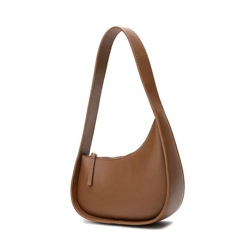 Small leather half moon shoulder bag with wide strap in four colour options