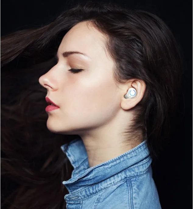 M18 true wireless stereo in-ear headphones in black and white colours showing compact design