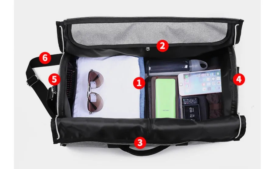 Medium-sized cylindrical travel bag in black Oxford cloth with a zipper and carrying handles.