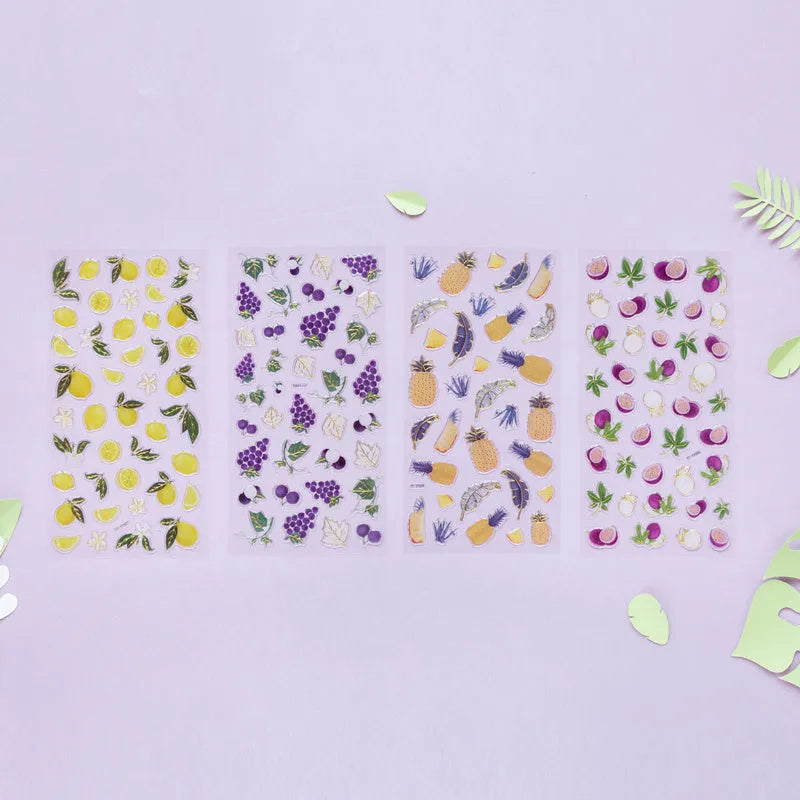 DIY fruit bronzing sticker set showing grape, orange, passion fruit, peach, pineapple, and strawberry designs