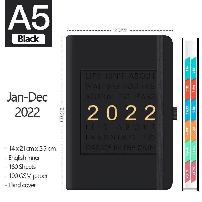 A5 imitation leather notebook with French fold binding open flat on a desk, seven colour options