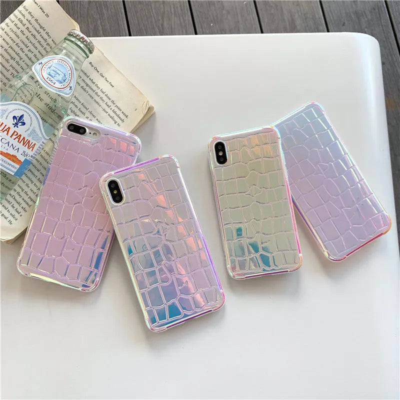 Silver glossy silicone laser phone case with textured surface for iPhone, showing lanyard hole and precise camera cutout.
