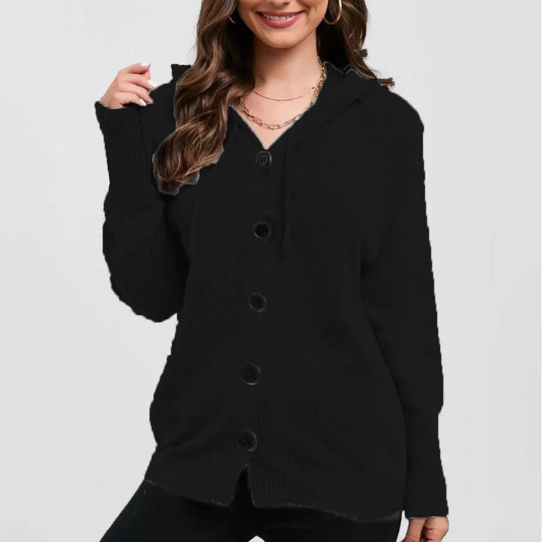 Women's loose-fit hooded cardigan in thick coloured cotton, shown in a solid colour with long sleeves.
