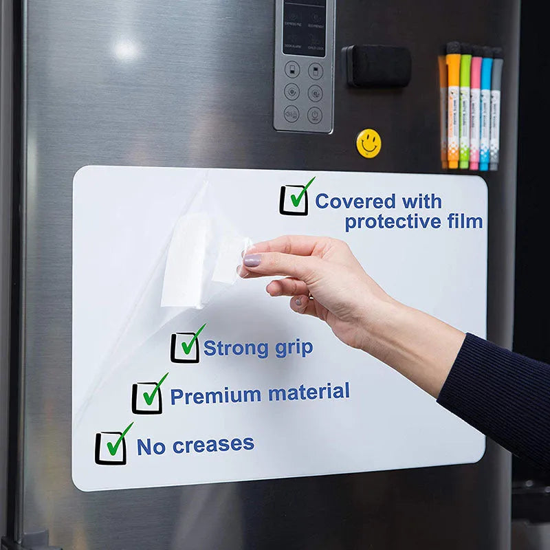 A3 magnetic soft whiteboard with rounded corners on refrigerator door showing handwritten notes