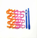 Twelve manual hair curlers in blue orange on a flat surface, 30cm length per curler