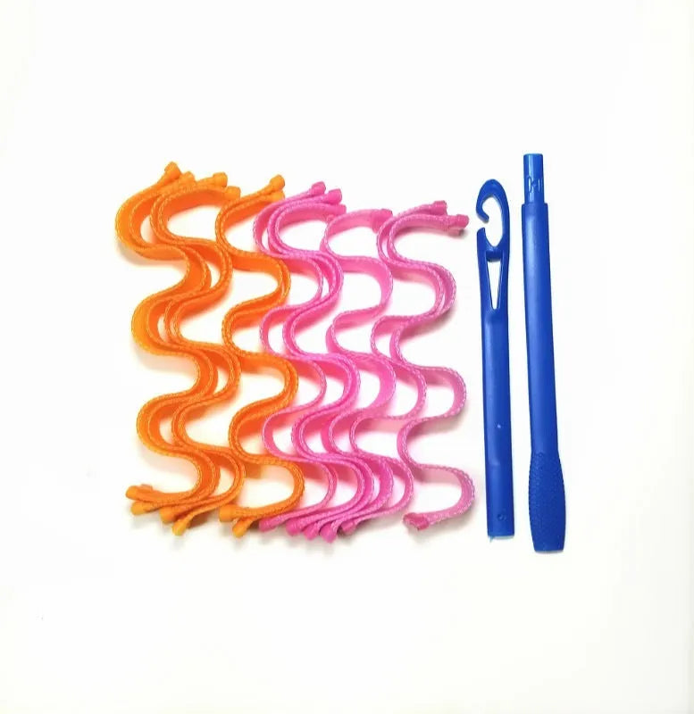 Twelve manual hair curlers in blue orange on a flat surface, 30cm length per curler