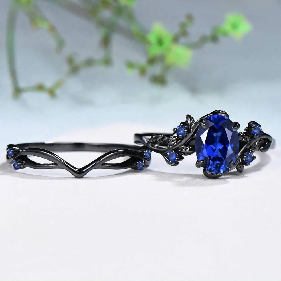 Gun black women's couple ring with navy blue rhinestone inlay on geometric copper band