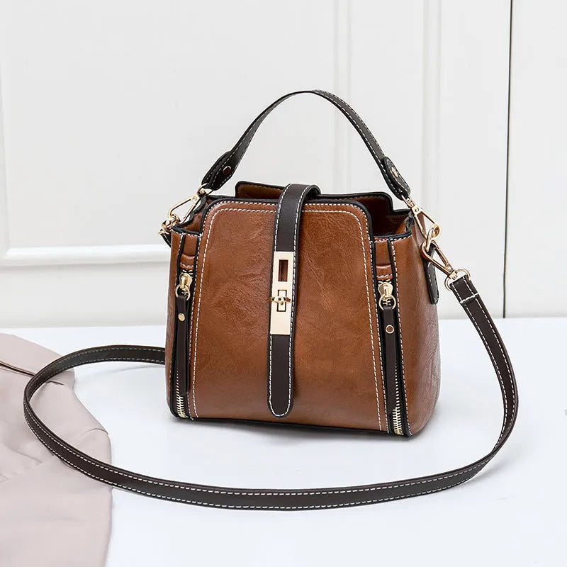 Faux leather women shoulder bag in black with detachable handle and adjustable strap