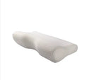Butterfly-shaped blue memory foam cervical pillow on a bed.