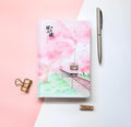 Muco hardcover notebook with sakura flower orbit AR design in pink, green, red, and yellow colour options
