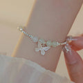 Hetian jade silver butterfly bracelet and necklace set with electroplated copper construction