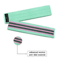 Set of three coloured fabric resistance bands (blue, pink, purple) and a mesh storage bag for fitness training.
