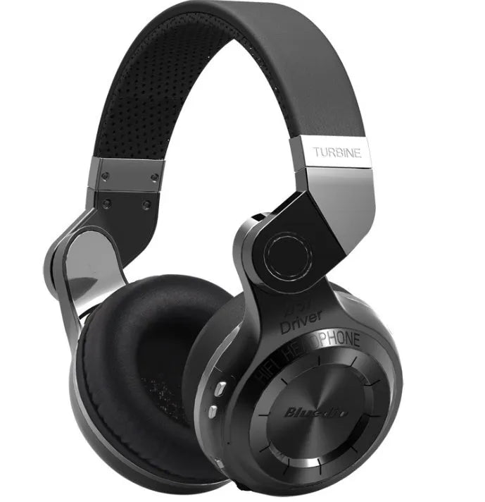 Black and white T2 Smart Edition over-ear Bluetooth headphones with a folding metal design and a detachable audio cable.