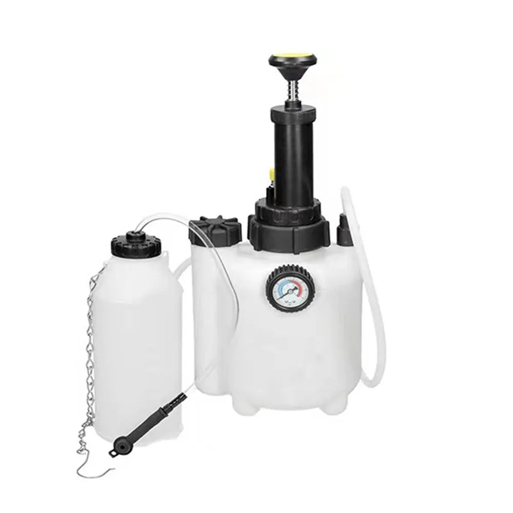 White 3-litre plastic brake fluid tank with copper and iron tools on a workshop bench.