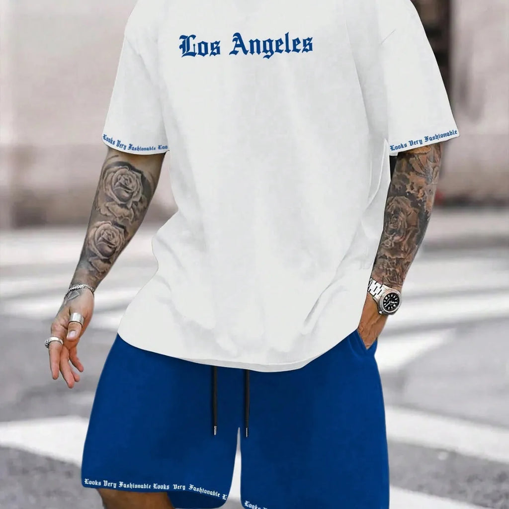 Men's blue sports style short-sleeved top and matching shorts laid flat
