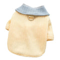 Yellow colour-block knit dog coat with bow tie collar on a small dog, suitable for autumn winter wear