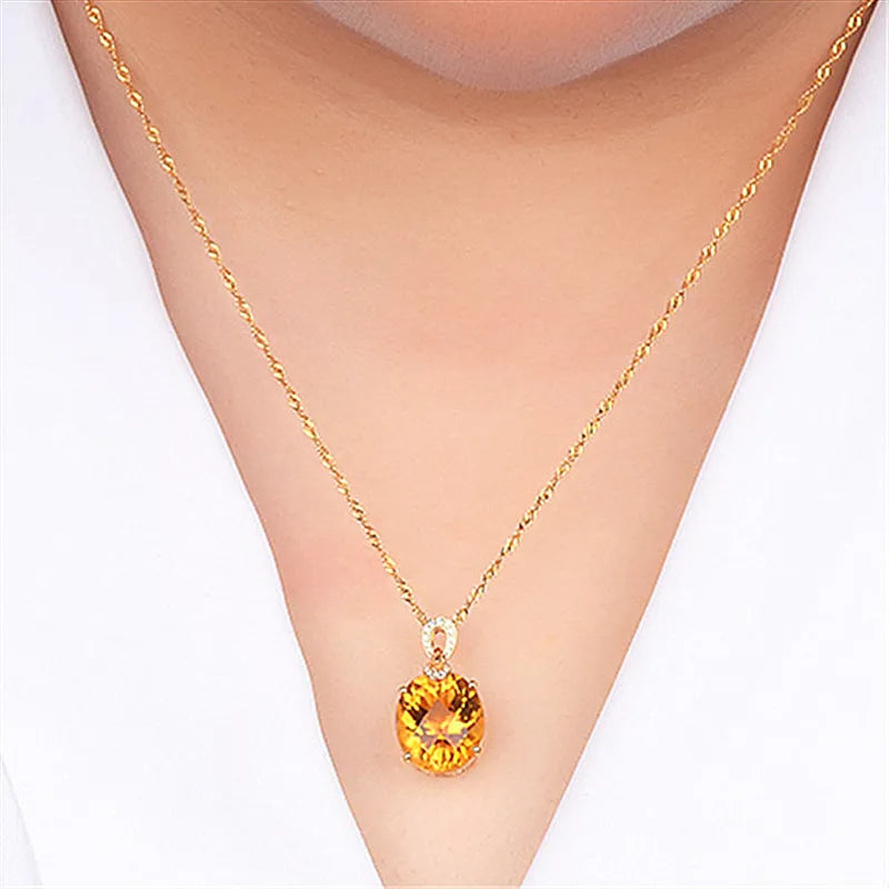New 8 karat natural citrine pendant in drop shape with copper base and yellow diamond finish