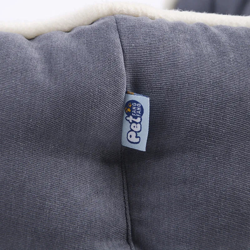 Blue memory foam pet cushion on floor with dog sitting on it, size L option shown