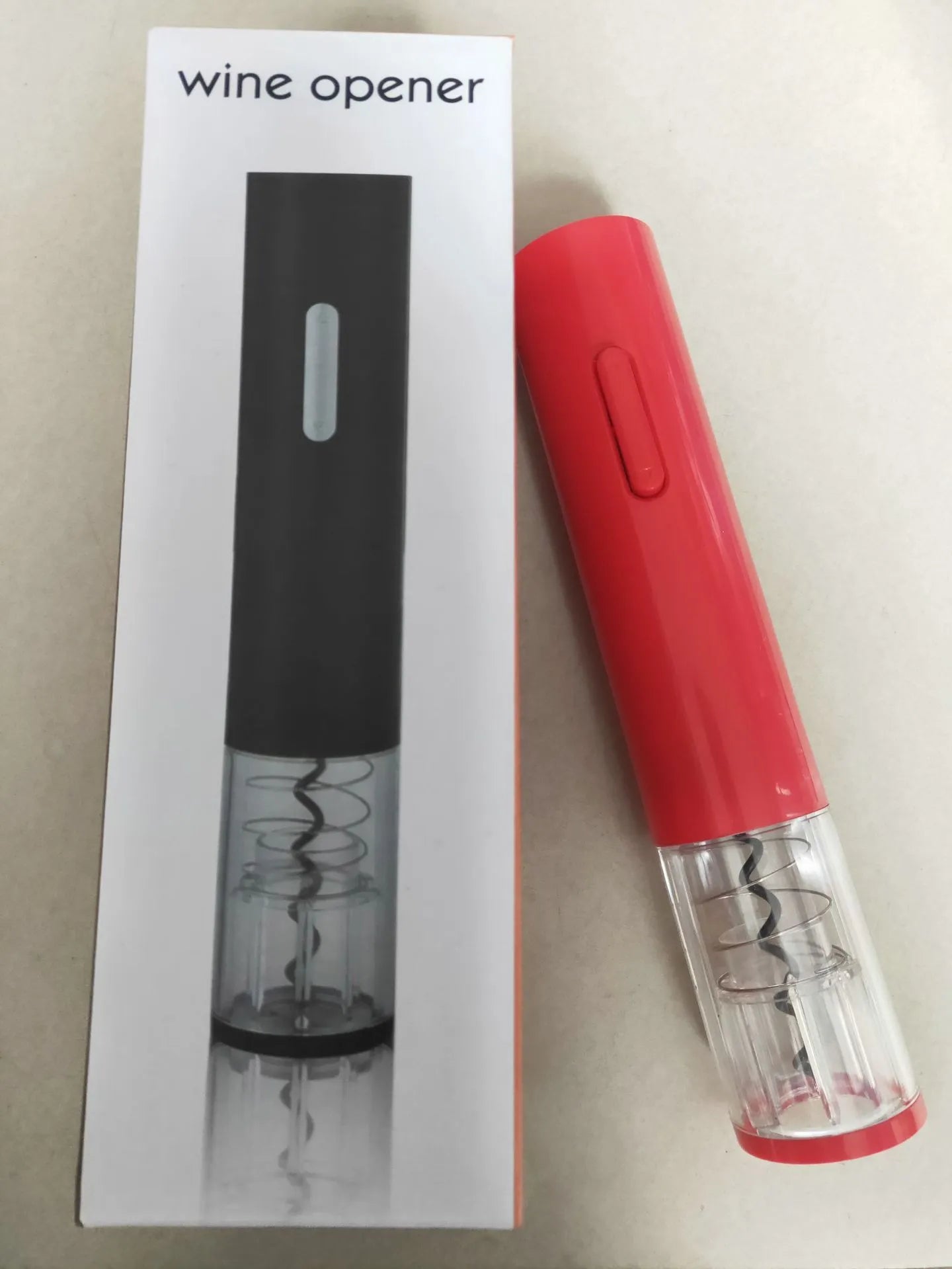 Automatic electric wine bottle opener with foil cutter in black, red, or white plastic finish.