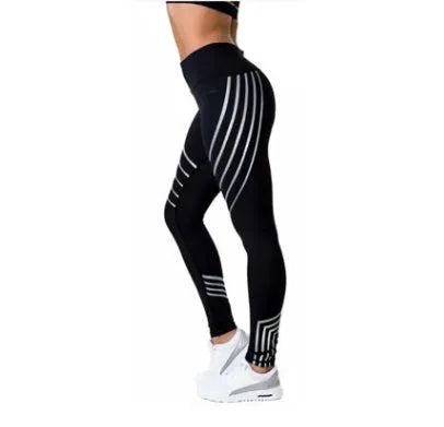 Women's black workout leggings with a glowing print pattern on the legs.