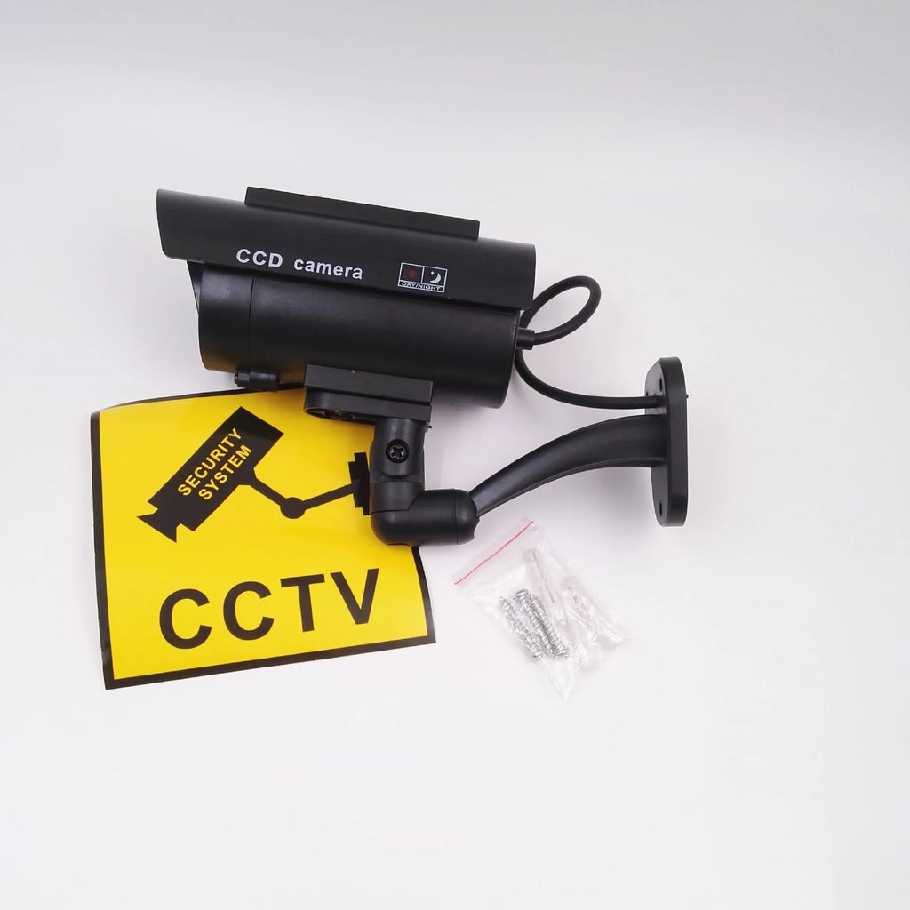 Black solar simulation gun camera with plastic construction for indoor and outdoor security