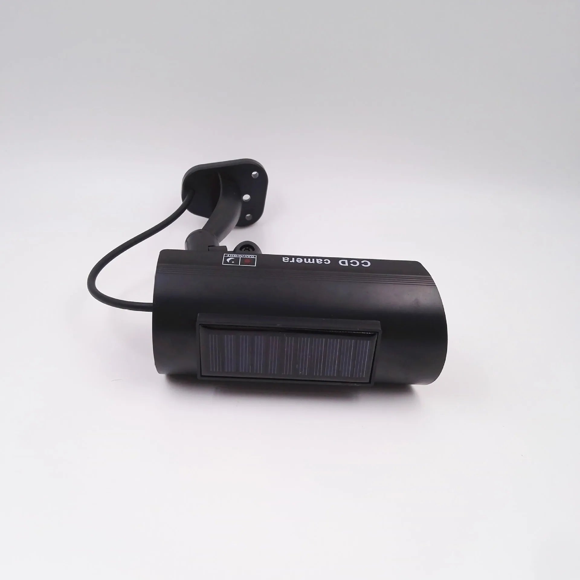 Black solar simulation gun camera with plastic construction for indoor and outdoor security