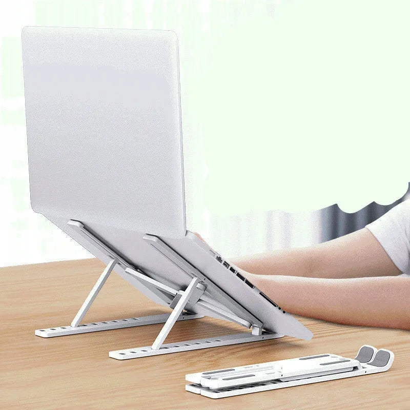 Black folding laptop cooling bracket shown open at an angle and folded flat next to its storage bag.