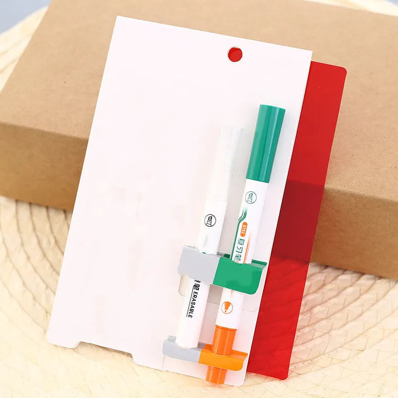 Green erasable highlighter and pen set with a separate eraser on a card pack.