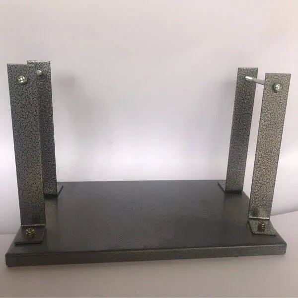 Black iron flip chip bracket stand for a small electric hand planer.