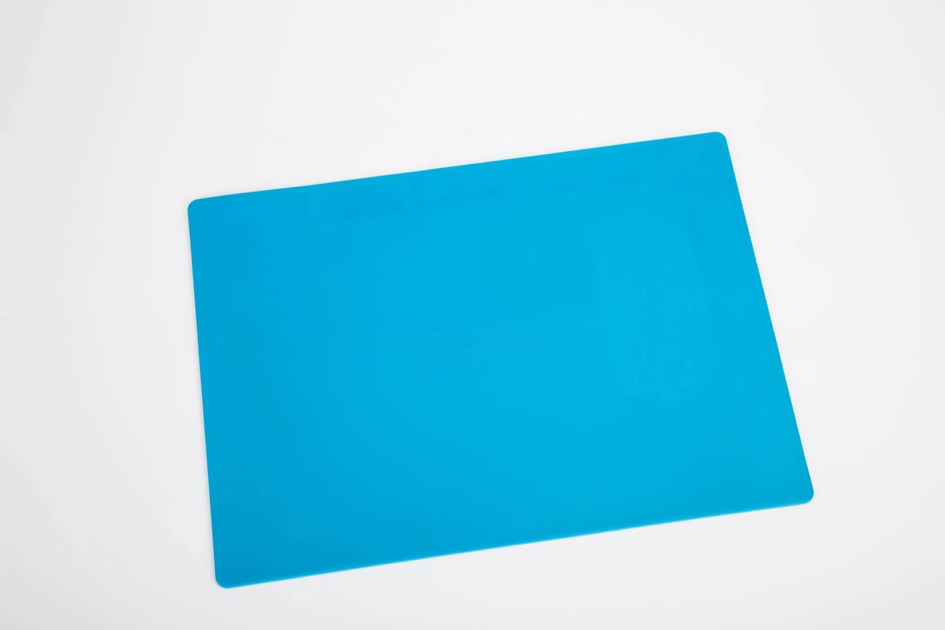 Blue silicone watch repair table mat with smooth non-slip surface for organising small components