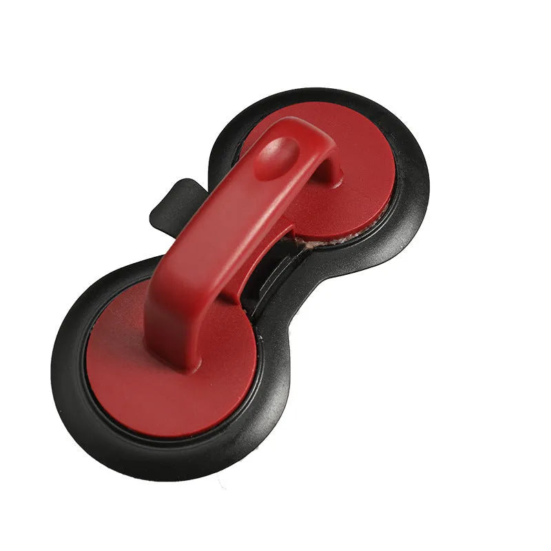 Black and red burger press mould with oil paper liners for making patties