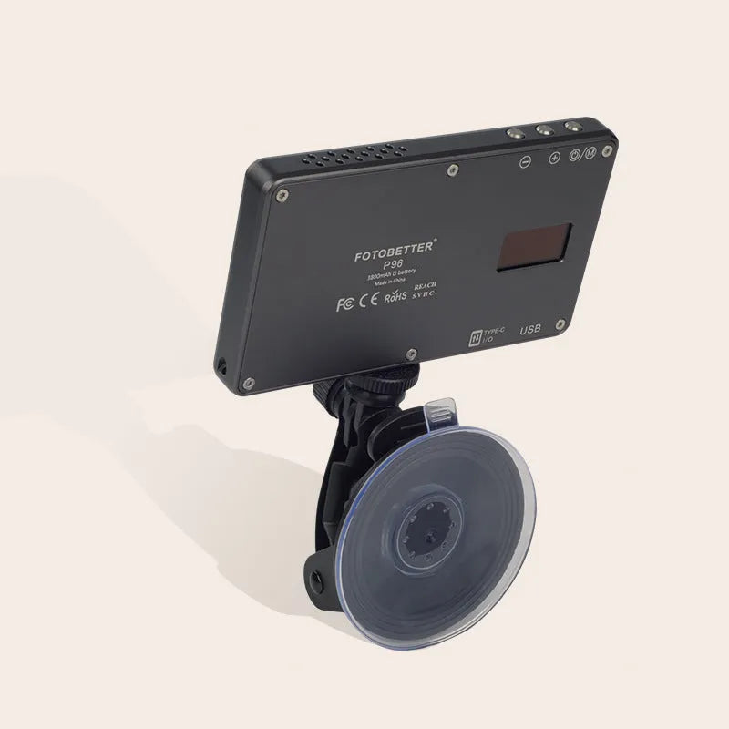 Black aluminium LED panel light for laptop video conferencing with USB-C port and LCD screen.