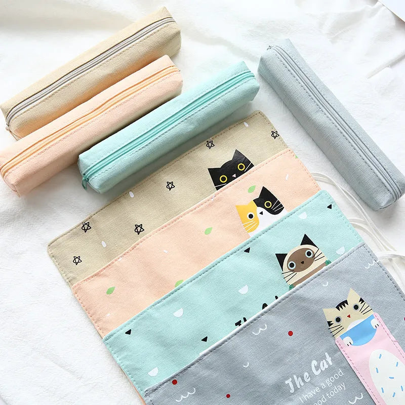 Korean cartoon style rolling pencil case in blue, green, pink, and yellow cat designs