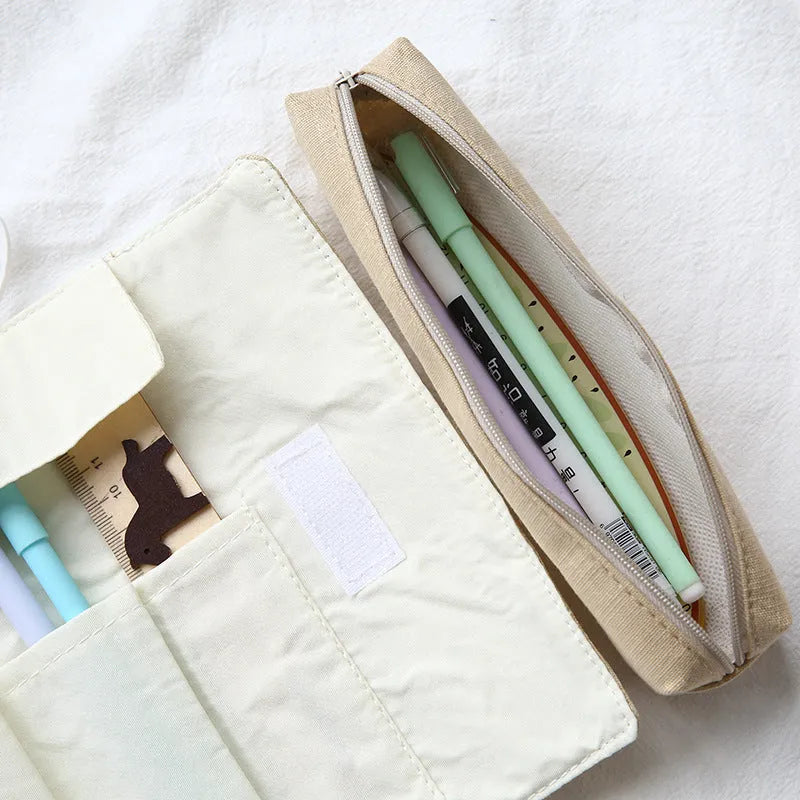 Korean cartoon style rolling pencil case in blue, green, pink, and yellow cat designs