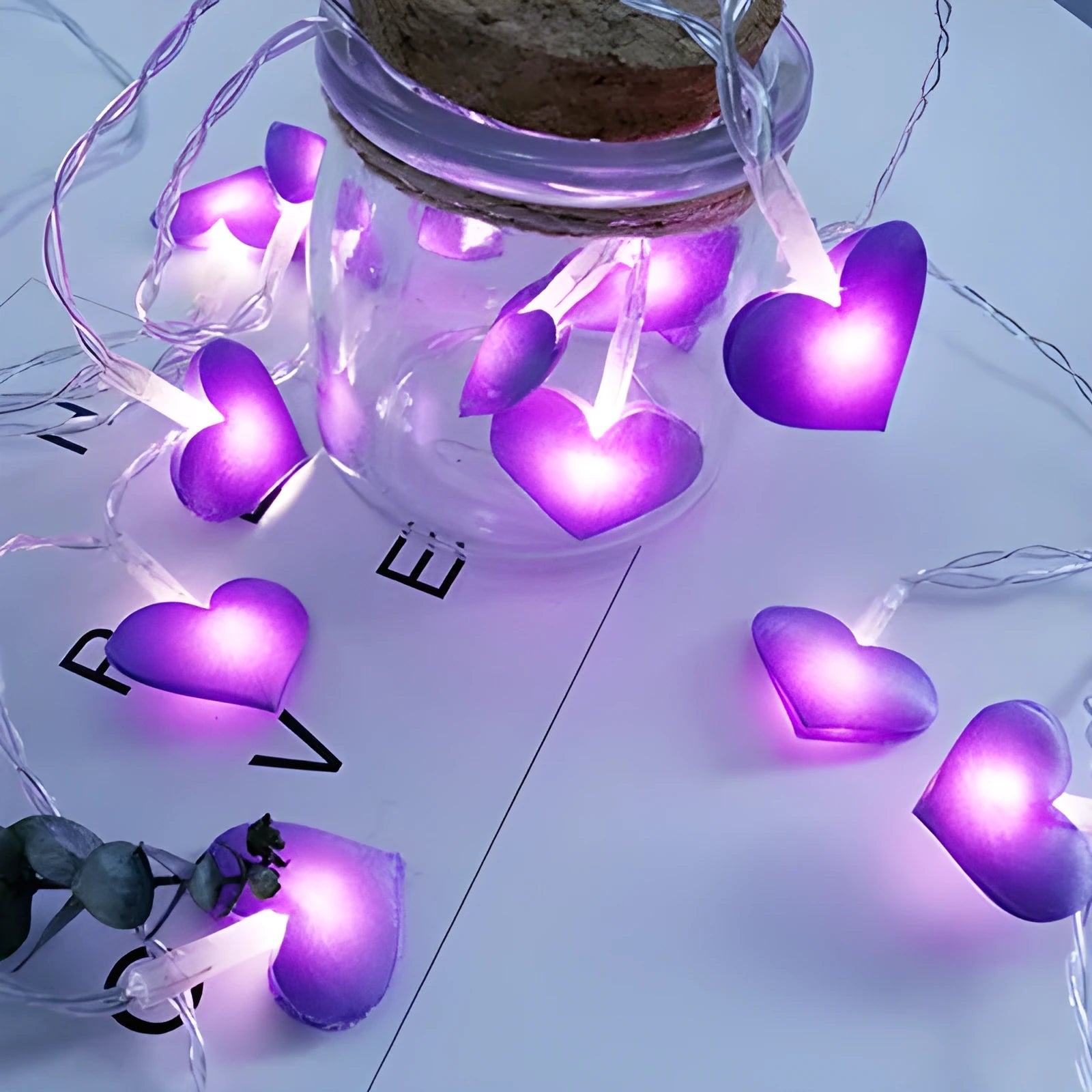 Battery-operated LED fairy string lights in pink or purple colours with 3 metre cable length for bedroom decoration