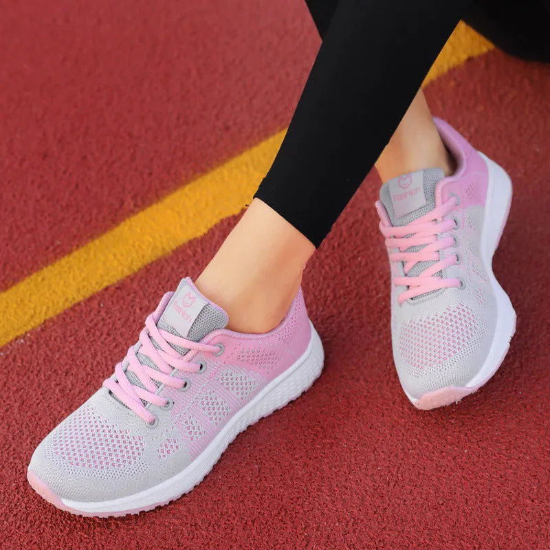 Women's white high-top casual sneaker with cross-bind strap and hollow-out detailing on a PU upper.