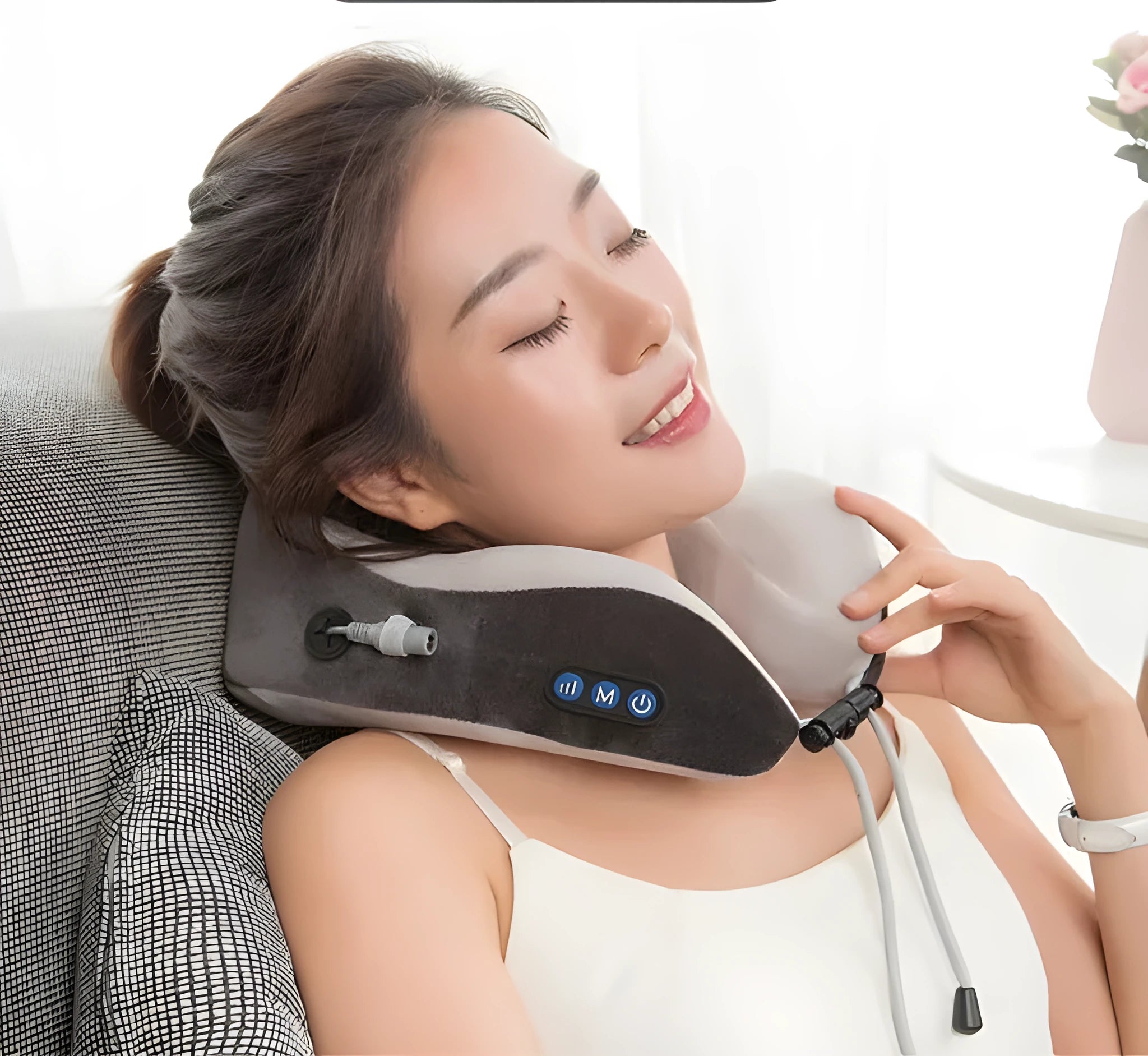 Electric neck massager U-shaped pillow in blue with memory foam and USB charging cable for shoulder relief