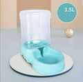 Plastic automatic gravity pet waterer and feeder in azure, pretty powder, or solid grey for cats.
