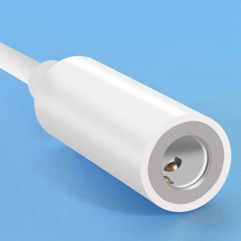 White Lightning to 3.5mm audio adapter cable for iPhone compatibility with charging port