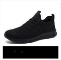 Men's black and white mesh sport sneakers with PVC soles for casual jogging