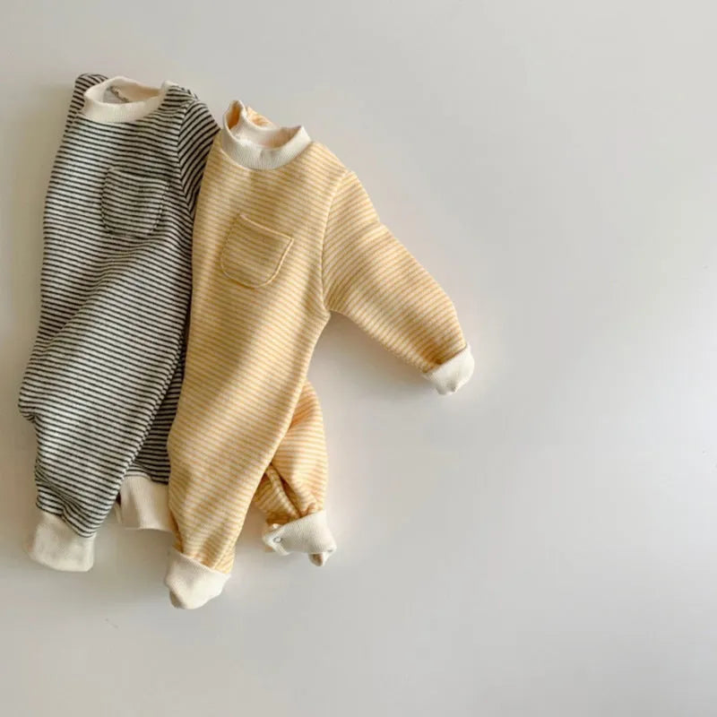 Striped cotton baby jumpsuit with long sleeves and hidden buttons for winter wear.