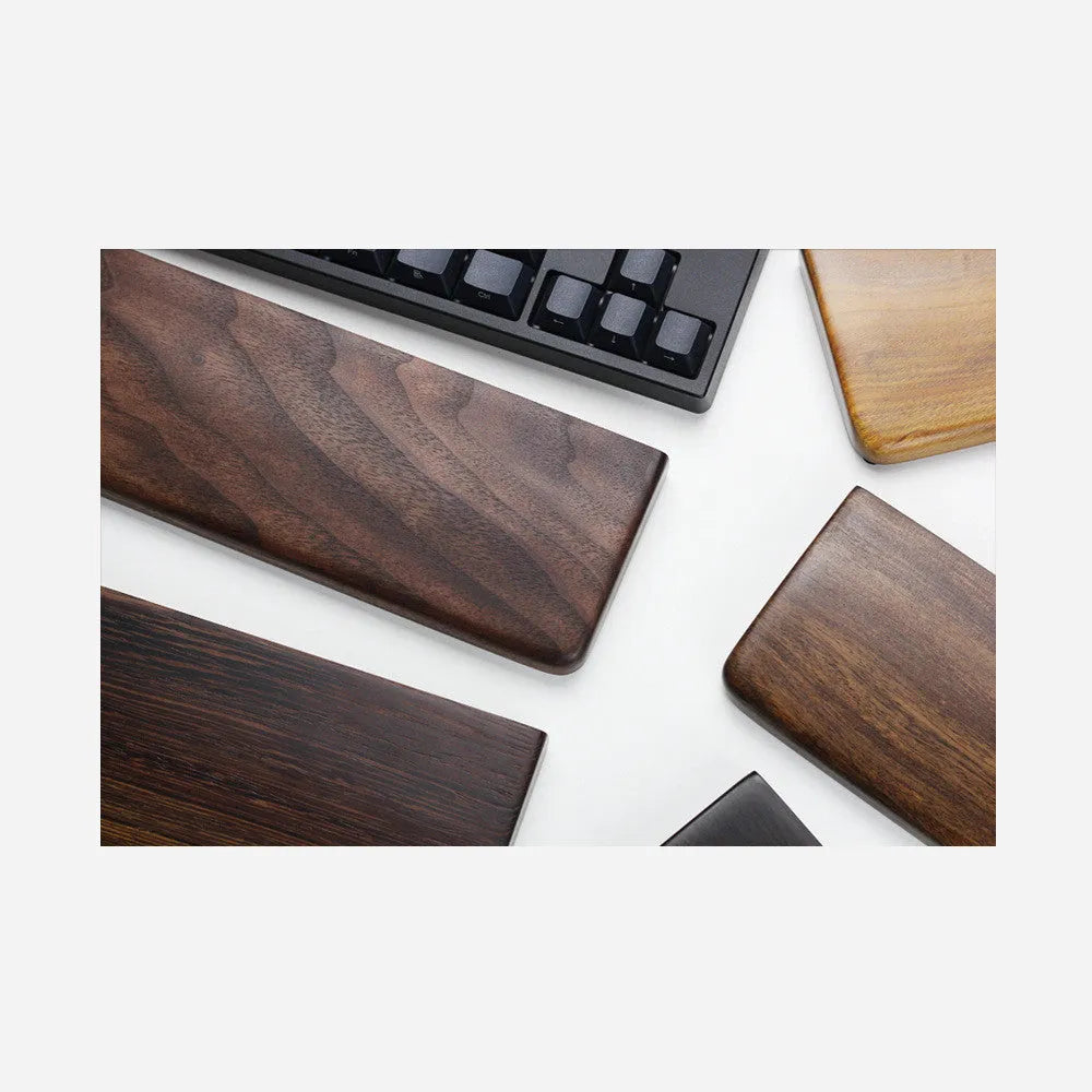 Black walnut wooden keyboard hand rest measuring 30cm long for 60% mechanical keyboards