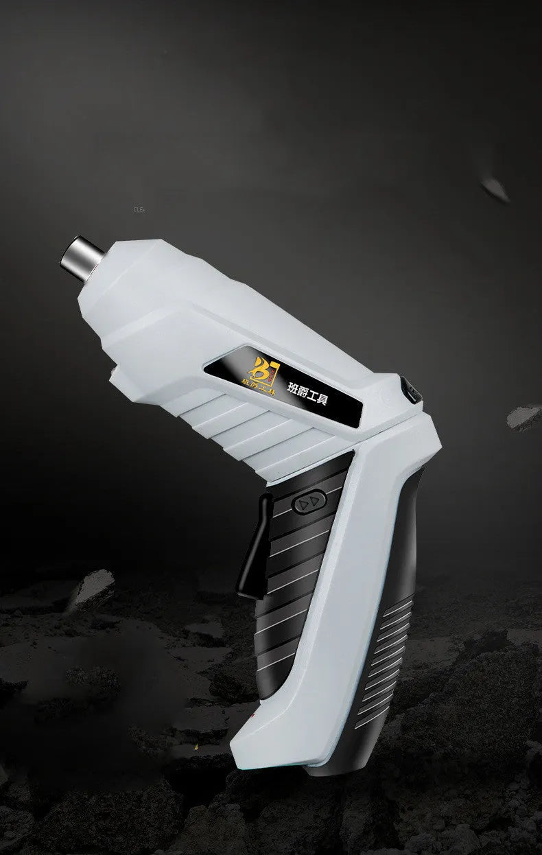 Black rechargeable lithium battery screwdriver with pistol grip on a workbench.