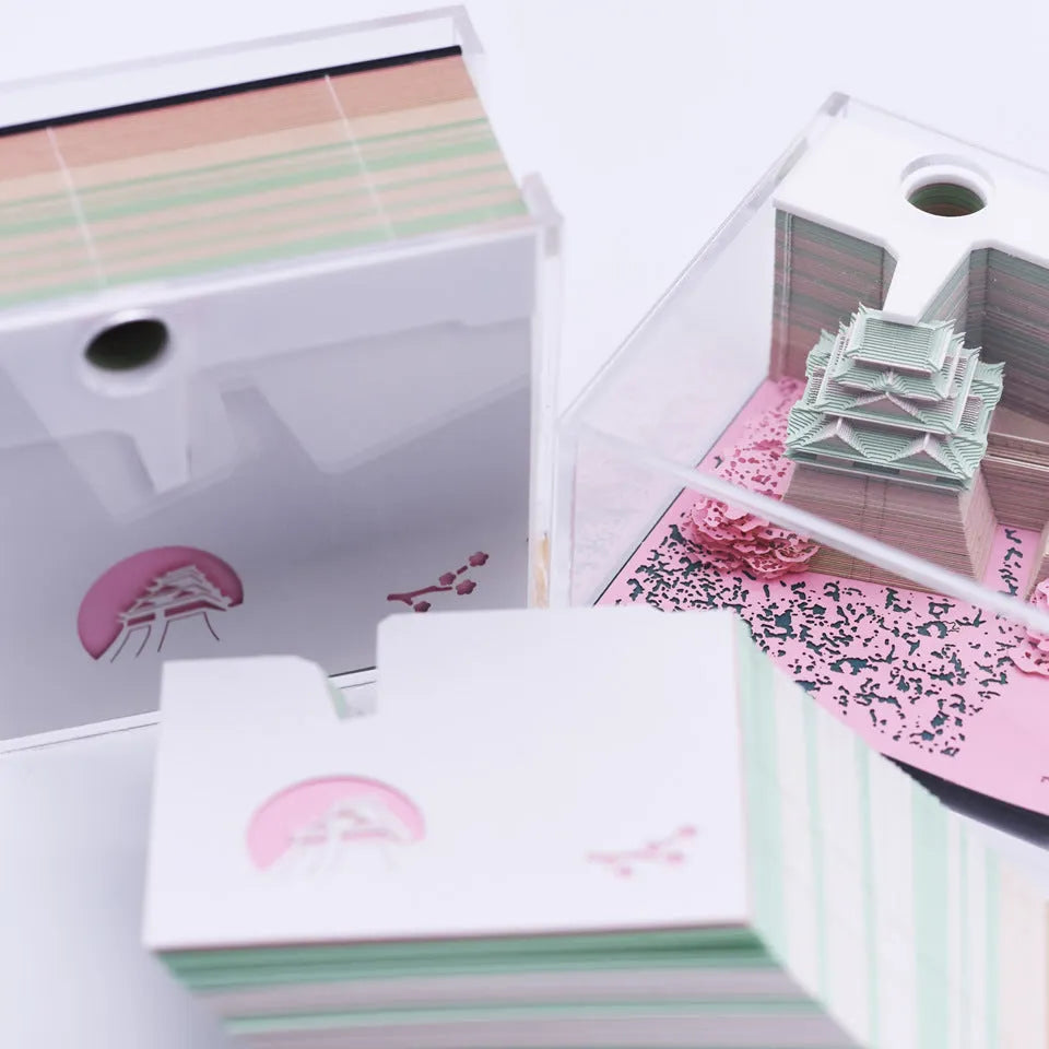 Spirited Away Tianshou Tower 3D papercraft architectural model kit in gold, pink, or white.