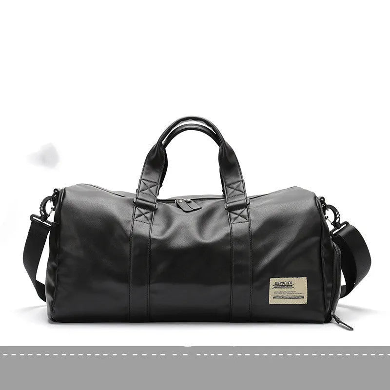 Black PU leather sports training bag with external handles, shoulder strap, and multiple internal organisational pockets.