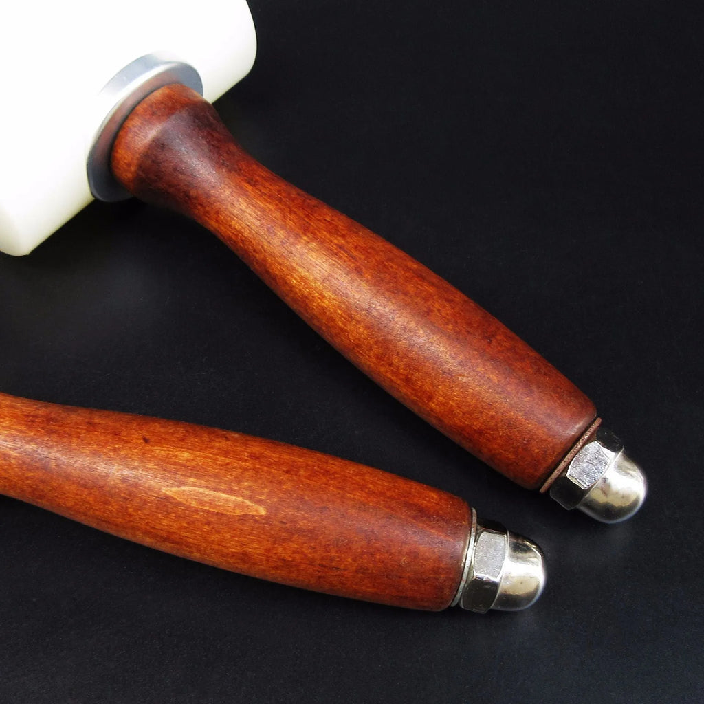 Brown handled T-shaped leather carving hammer with white nylon head for stamping and engraving