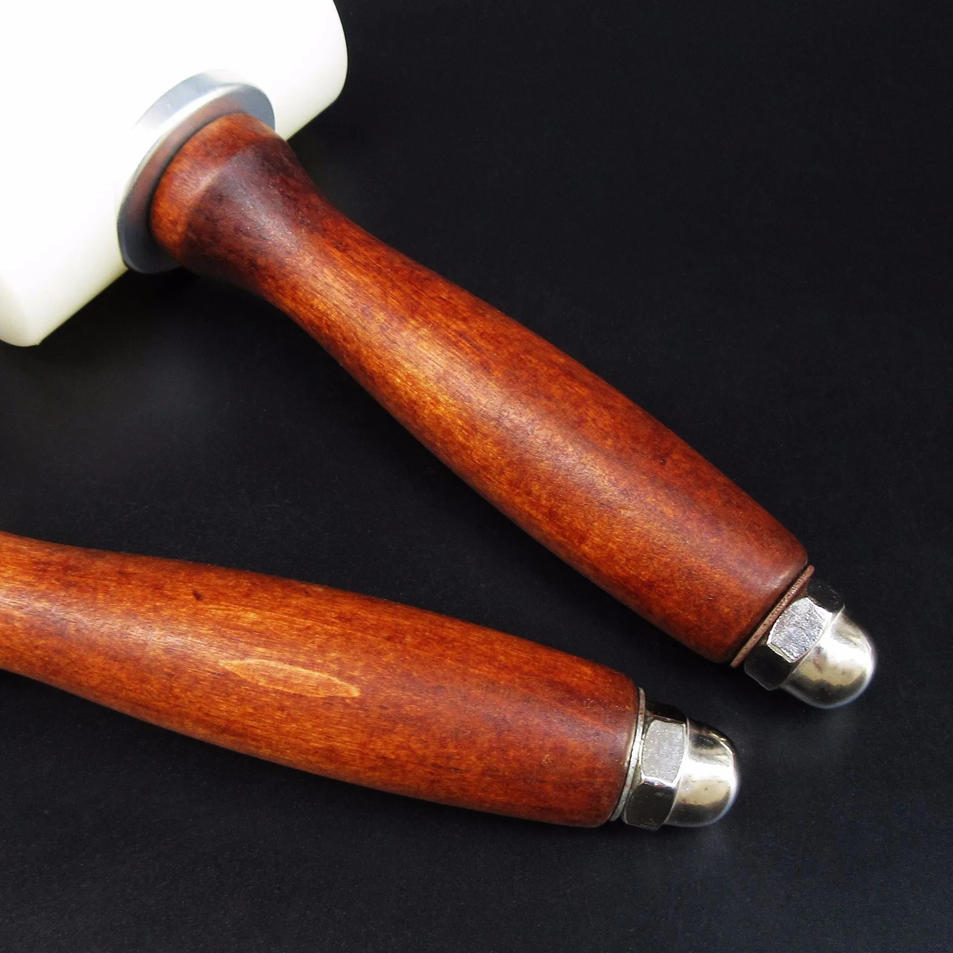 Brown handled T-shaped leather carving hammer with white nylon head for stamping and engraving